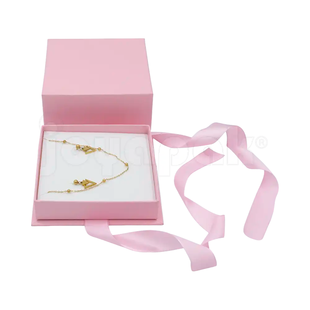 Caja Milán para juego de cartón rígido texturizado Rosa PK de frente.