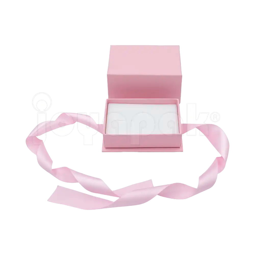 Caja Milán para argollas de cartón rígido texturizado Rosa PK abierta de frente.