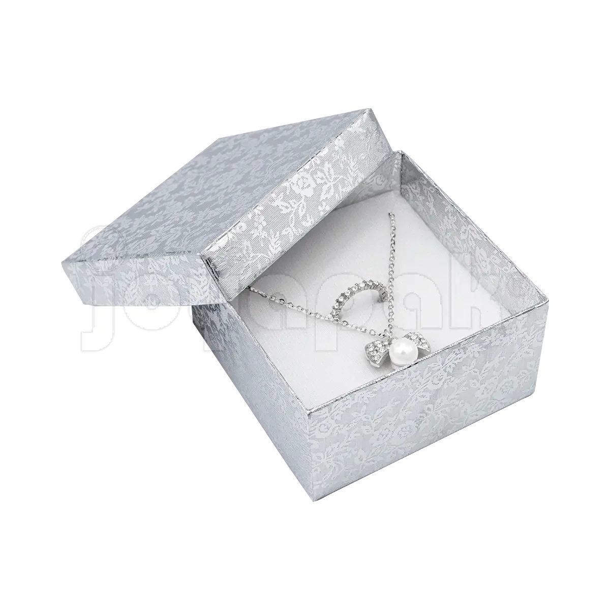 Un reloj de pulsera para hombre presentado sobre el cojín dentro de la caja Fiore plateada cuadrada alta abierta.Un reloj de pulsera para hombre presentado sobre el cojín dentro de la caja Fiore cuadrada alta abierta.