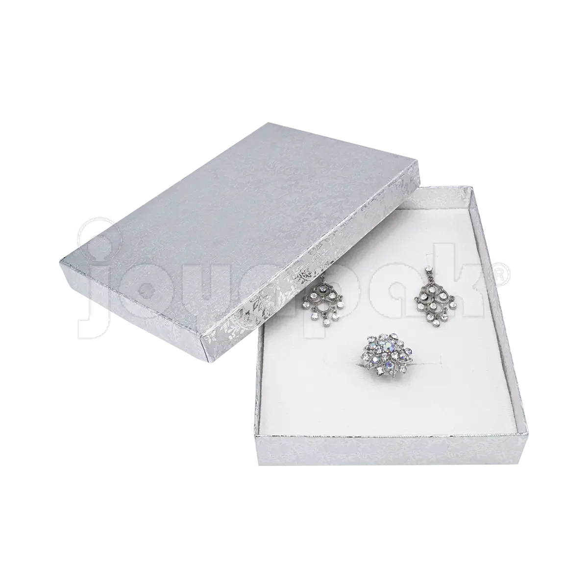 Un juego de collar y aretes de fiesta presentado de forma elegante dentro de la caja Fiore plateada grande abierta.