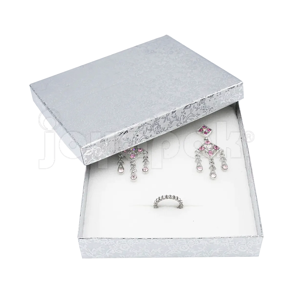 Un coordinado de collar y aretes de plata presentado dentro de la caja Fiore plateada abierta para mostrar su tamaño y ajuste.