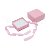 Caja Milán para aretes de cartón rígido color Rosa PK abierta con base blanca.