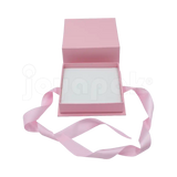 Caja Milán para juego de cartón rígido texturizado color Rosa PK abierta de frente.