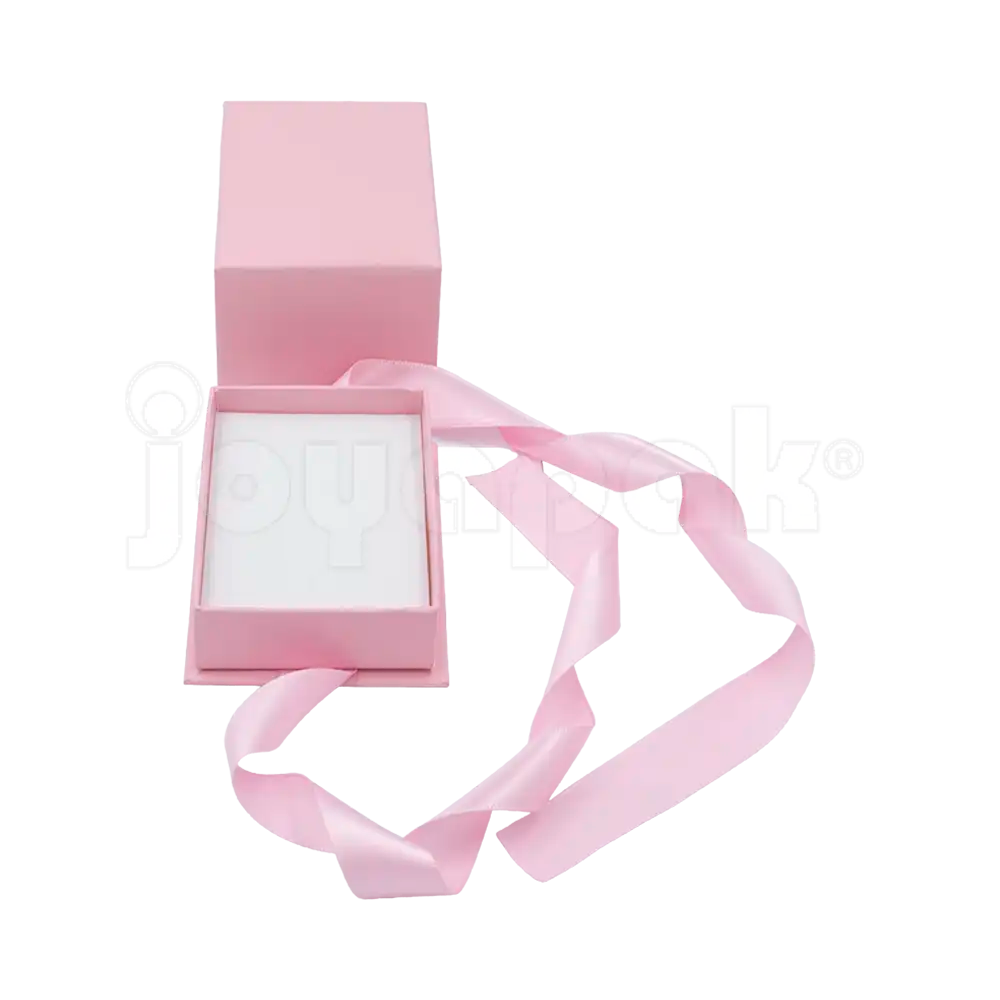 Interior con dos ranuras de la caja Milán para argollas de cartón Rosa PK abierta.