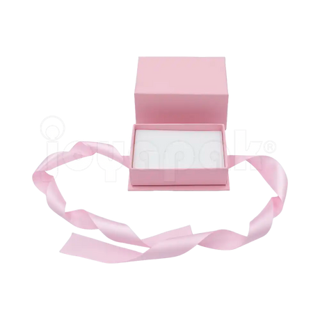 Caja Milán para argollas de cartón rígido texturizado Rosa PK abierta de frente.