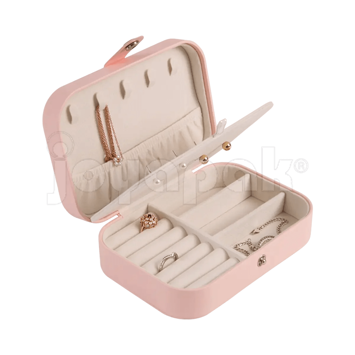 Alhajero de viaje texturizado color rosa pastel con cierre, abierto mostrando compartimentos para anillos y aretes con joyería colocada.