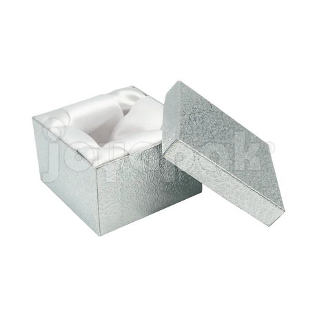 Empaque para joyeros en México, caja para reloj plateada de mayoreo con cojín protector.