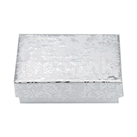 Interior de la caja Fiore chica con ranura de terciopelo para colocar un anillo o broqueles de forma segura.