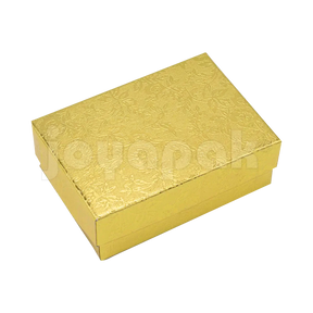 Caja Fiore mediana para juego de joyería en color dorado con acabado metálico y diseño floral.