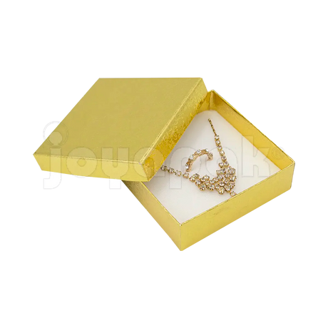 Interior de la caja Fiore cuadrada con cojín de terciopelo y elásticos para sujetar una pulsera.