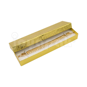 Interior de la caja Fiore para pulsera mostrando el cojín de terciopelo con elásticos para sujetar la pieza.