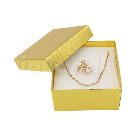 Un reloj de pulsera para hombre presentado sobre el cojín dentro de la caja Fiore cuadrada alta abierta.