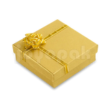 Caja de cartón cuadrada para aros de la colección Fashion, en color amarillo y con un moño decorativo en la tapa.