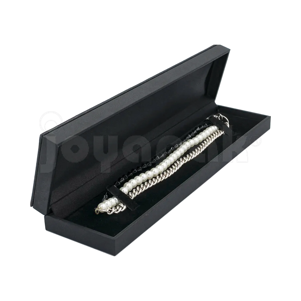 Estuche Italia de color negro con marco interior dorado estrecho para pulsera, caja abierta alargada mostrando una pulsera fina colocada sobre terciopelo blanco.